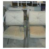Set of four metal framed patio chairs with