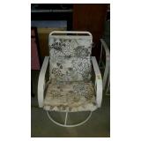 Single patio swivel chair with cushion. Cushion