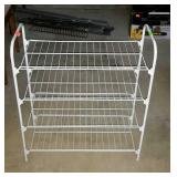 Four tiered metal wire shoe rack. 24"×12"×28".