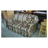 Love seat with three matching throw pillows -