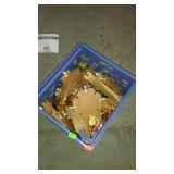 Plastic crate with toy train track pieces Thomas