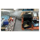 Three skids misc stuff, fishing rods, Chair