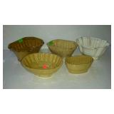 Group of pottery molds and yellow ware some chips