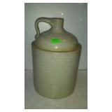 Pottery whiskey jug, moonshine jug that is about