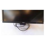 Dell 24" flat screen computer monitor has stand