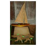 Group it wooden sailboat, cutting board, and fox