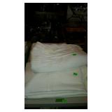 Group with three white blankets