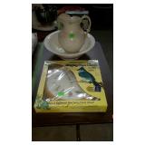 Pitcher and bowl and bird clock
