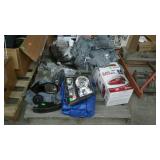 Skid lot includes truck parts and car cover