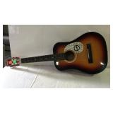 Accoustical guitar by Global - minor nicks on