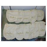 11 cream-colored Crown royal bags.