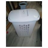 Plastic clothes hamper on wheels 27' tall