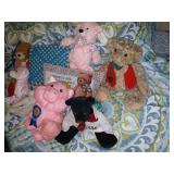 Stuffed animals and 2 pillows