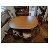 Dining room table and 6 windsor back chairs. 71'