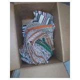 Box of miscellaneous rugs.