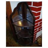 Mirror back corner stand, 42 inches tall.