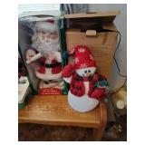 Animated Santa Claus and snowman.