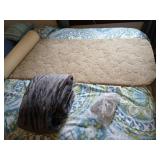 Electric blanket and a rug.
