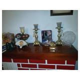 All pictured on top of fireplace candle holders