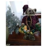 Silver Christmas tree and a bear.