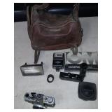 Vintage olympus camera outfit w/ case and more