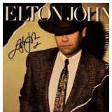 Elton John signed Breaking Hearts album