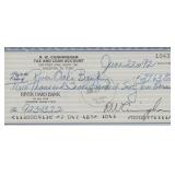 Astronaut Walter Cunningham signed check