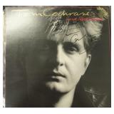 Tom Cochrane signed album