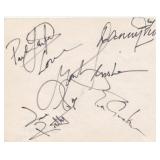 The New Seekers autographs all on one page...