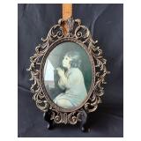Metal picture frame with bubble glass