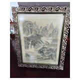 Asian linen artwork in ornate metal frame