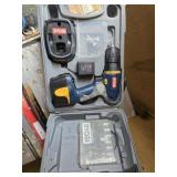 Ryobi drill with battery and charger working