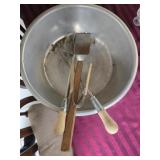 Large aluminum pan with utensils