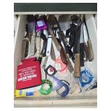 Drawer full of knives and more