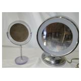 2 make up mirrors 1 is lighted