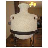 Fragile ceramic like vase with stand