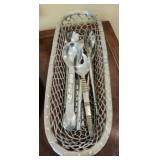 Basket with serving utensils