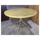 Yellow metal outdoor table