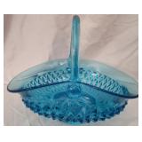 Large blue glass decorative basket