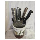 Porcelain container with kitchen knives