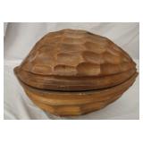 Large wooden container with nutcracking tools