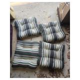 Set of 4 outdoor chairs cushions .