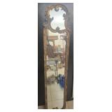 Plastic framed on the wall mirror