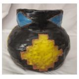 Yellow blue and black pottery bowl