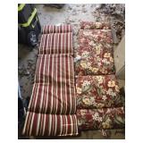 Pair of red outdoor lounger cushions
