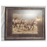 Framed print of horses running