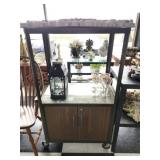 Large metal rack with wheels contents not included