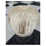 Small champagne color circular ottoman