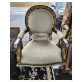 Large beige color upholstered chair