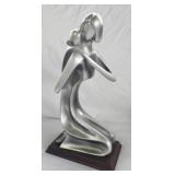 Silver color mother and child statue